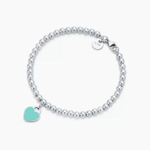 Tiffany double sided silver and blue heart bracelet